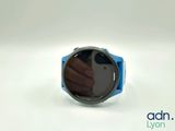 someone is taking a picture of a smart watch with their cell phone