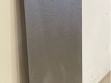 an image of a metal door in a room