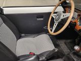 an image of a car with a steering wheel and dashboard