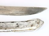 two knives that have been left on the table