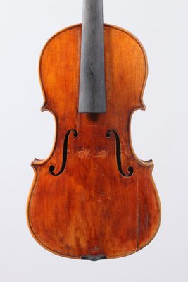 an old violin with a bow on a white background