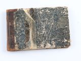 an old book that has been left open on the table
