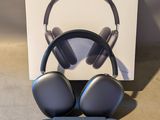 an image of a pair of headphones sitting on top of a pair of flip flops