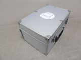 a silver metal box with a white logo on it
