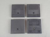three nintendo game cartridges sitting on top of each other on a table