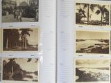 an open book with pictures of a beach and palm trees on it
