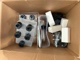 a cardboard box with a bunch of items inside of it