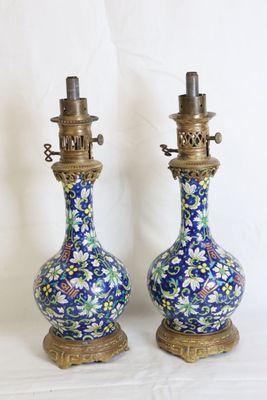 Paire de lampes à huile et à modérateur en porcelaine polych…