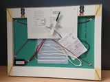 a picture of a picture of a board with wires and wires attached to it