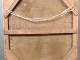 an old wooden box with a rope hanging from it ' s sides