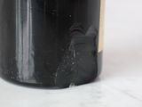 a bottle of wine that is sitting on a table