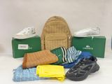 several pairs of shoes, a backpack, a pair of socks, a pair of socks, a pair of socks, a pair of socks, and a pair of