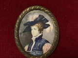 portrait of a woman in a blue hat and blue dress