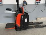 a picture of a forklift parked in a garage