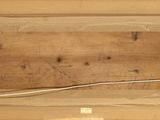 a picture of a piece of wood with a wire on it