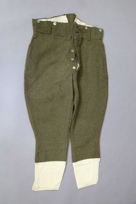 a close up of a pair of pants with buttons on them