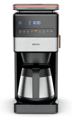 a black and silver coffee maker on a white background