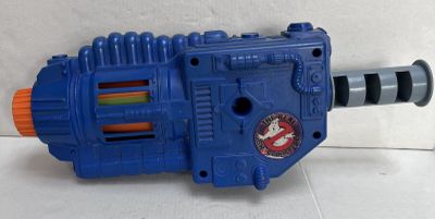 an image of a toy gun that is blue and orange