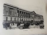 a black and white photo of a horse and buggy in front of a building