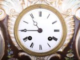 a clock that is on the wall in the room