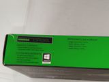 a box with a green label on it sitting on a table