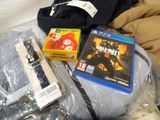 a lot of items that are on the bed