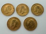 four gold sovereigns, one of which is a sovereign and four of which are sovereigns