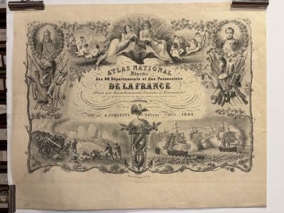 an old poster hanging on the wall of a room