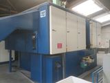 a large machine that is sitting inside of a building