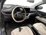 the interior of a car with a steering wheel and a dashboard