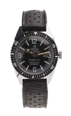 a close up of a watch on a white background with a white background