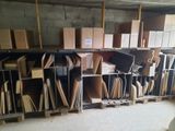 a room filled with lots of boxes and shelves