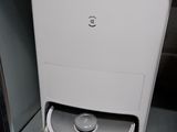 an image of a toilet in a small room
