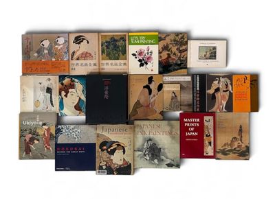 a lot of books that are sitting on a table