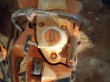 a chainsaw that is sitting on the ground