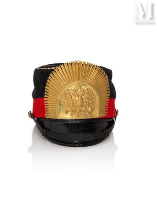 a black hat with a gold sun on it