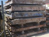 a pile of steel bars stacked on top of each other
