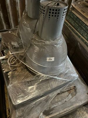 a metal stove that has been wrapped up and ready to be used
