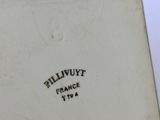 a close up of a white plate with black writing on it