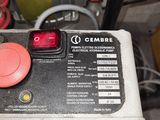 a close up of a control panel with a red button