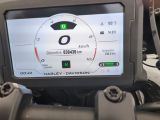 a close up of a motorcycle ' s dashboard with a speedometer