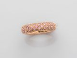 an 18k rose gold ring with pink sapphires and diamonds