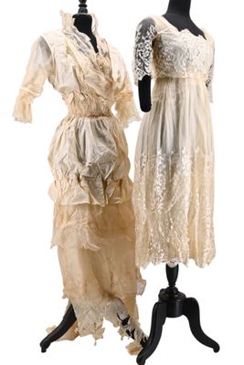 two dresses on mannequins on display on a white background