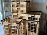 many crates stacked on top of each other in a room