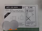 the box is open on the white surface with a green polka dot pattern