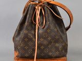 Sac seau Louis Vuitton en toile Monogram et cuir