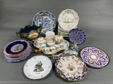 many plates and bowls that are sitting on a table
