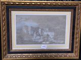 une vieille photo représentant un tableau d'un château, dans un cadre doré