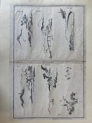 un vieux livre sur lequel figurent des dessins représentant des personnes et des animaux