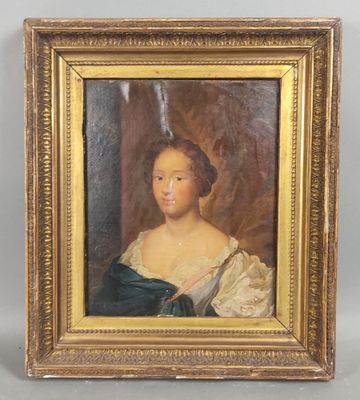 un tableau représentant une femme en robe bleue, dans un cadre doré